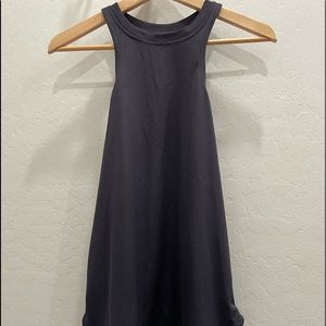 Nike tank top. Only worn a couple of times. True to size but long on length.